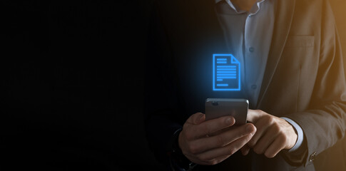 Businessman man holding a document icon in his hand Document Management Data System Business Internet Technology Concept. Corporate data management system DMS