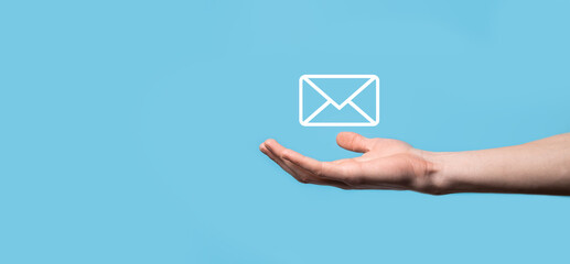 Male hand holding letter icon,email icons .Contact us by newsletter email and protect your personal...