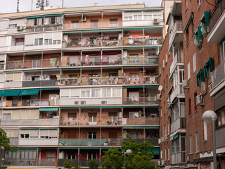 POOR NEIGHBORHOOD IN SPAIN AREA STREET WITH CLOTHES AND GARBAGE