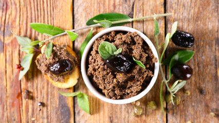 black olive tapenade and tree branch
