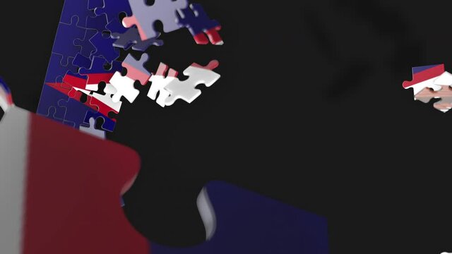 Animation of jigsaw puzzle assemble. Problem solving and completing concept. American Samoa national flag integration. Symbol of association and connection. Isolated on dark background.