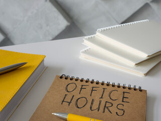 Office hours written by hands on the page.