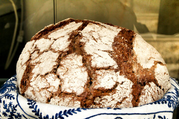 Loaf of tasty bread in a bakery showcase