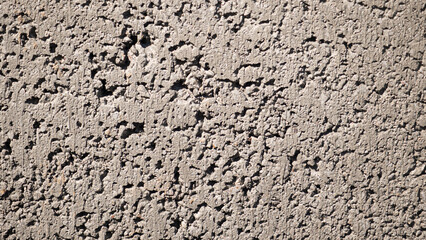 Light grey clay brick and mortar wall in. wallpaper background. Place for text, title