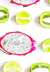 Tropical fruit design on white table background top view
