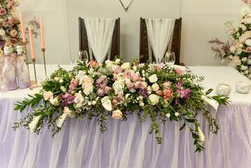 Beautiful floral compositions in the restaurant for the wedding ceremony