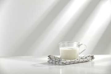 Fresh cold milk in glass and free space for your decoration 