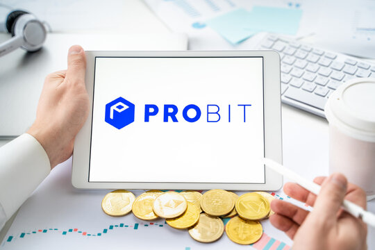Russia Moscow 06.05.2021.Businessman with tablet.Logo of cryptocurrency stock exchange Probit.Trading blockchain platform to buy,sell digital crypto coins,tokens Bitcoin,Ethereum.Business,investing