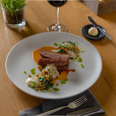 Roasted duck meal on table