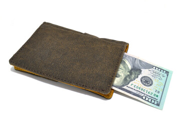 Money in wallet close-up on white background. Dollars, business, finance, economy, banknotes