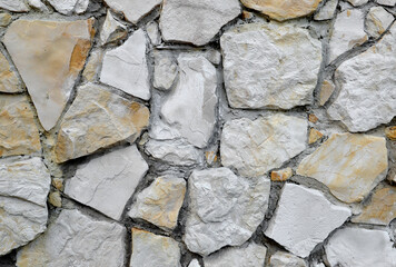 Background of bright stone wall mosaic texture