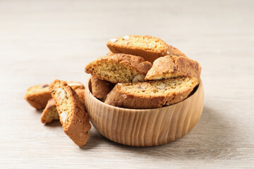 Traditional Italian almond biscuits (Cantucci) on white wooden table