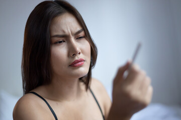 woman trying to stop smoking, concept of world no tobacco day, quit smoking, female smoker, secondhand smoking