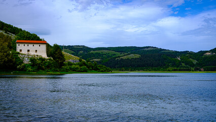 Fototapeta na wymiar panorama of Laceno lake, Campania, Italy. green mountain panorama. spring