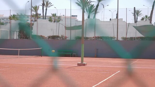 Empty tennis court during the pandemic in slow motion 250fps