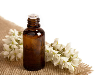 Facial oil, serum or cannabis oil. Natural cosmetic. Flowers white