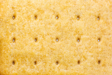Roasted cookies texture background. Loaf Bakery concept. Close up, macro photo. Beautiful natural wallpaper.