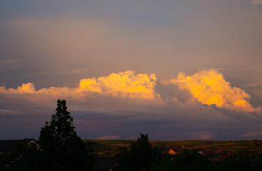 Panoramic view of beautiful thunderclouds. Beautiful dramatic  blue sky background. Rainy weather. Soft focus photo. Stormy sky.