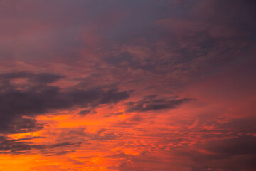 Naklejka na ściany i meble Beautiful dramatic sky. Sunset or sunrise time. Amazing purple clouds. Soft focus photo.