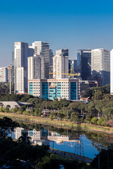 Fototapeta na wymiar City skyline, with Marginal Avenue and Pinheiros River in the foreground, in the south zone of Sao Paulo, Brazil