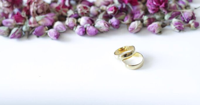 wedding rings and flower