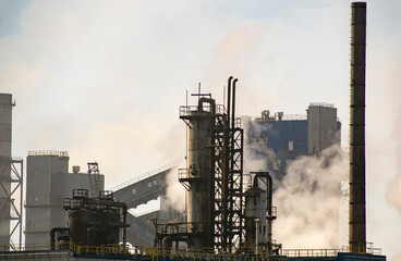 Industrial plant with smog emissions. Ecological concept.
