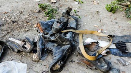 Old used Police Boots thrown to garbage in Dhaka, Bangladesh