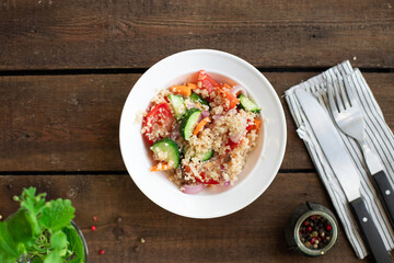 couscous salad tomato, onion, cucumber, spices vegetables appetizer fresh portion organic on the table healthy food meal snack copy space food background rustic. top view keto or paleo diet