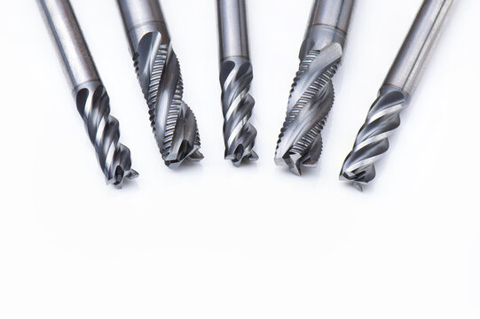endmill set. cutting tools special. spiral right hand Four-teeth . material Carbide and high speed steel, coating Titanium nitride. isolated on white background.