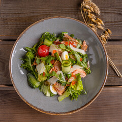 fresh salad with salmon fish