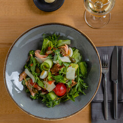 fresh salad with salmon fish