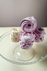 The marshmallow is curly in a glass vase. High quality photo