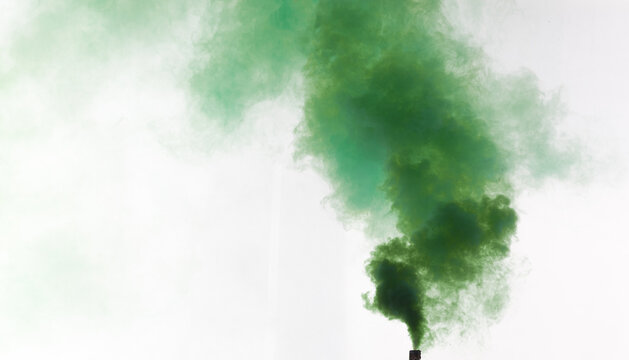 green smoke bomb isolated on white background