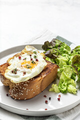 Homemade Fried Eggs with Brioche and Lettuce Salad