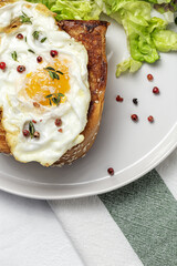 Homemade Fried Eggs with Brioche and Lettuce Salad