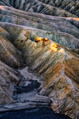 Badlands view from Zabriskie Point in Death Valley National Park at Sunset, California
