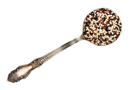mix of quinoa seeds in tablespoon cutout