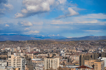 Panorama of a densely populated city. Tbilisi city landscape from above