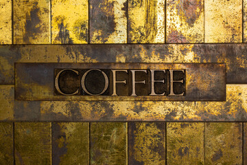 Coffee text on textured copper and gold background