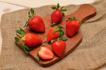 strawberries on a cutting board ingredient for cooking