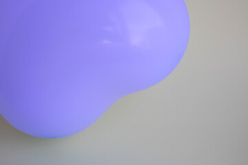 Purple balloon in the shape of a heart on a gray background. Wedding concept, Valentine's Day, photo zone, lovers. Banner. top view