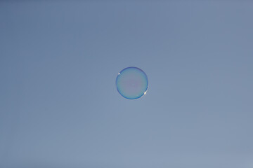 soap bubbles on blue sky