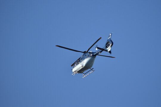 Buenos Aires, Argentina - September 28, 2020: Helicopter Airbus EC-135, tail number LQ-BXI, in flight. It is used by the Police of Argentina