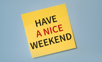 Have a nice weekend text on light yellow stciker against blue background.