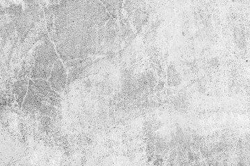 Texture of a concrete wall with cracks and scratches which can be used as a background
