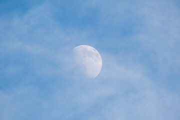 Obraz na płótnie Canvas full moon in the sky with some cloud dust