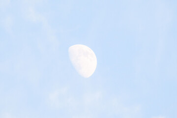 full moon in the sky with some cloud dust