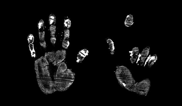 handprint from flour on a black background