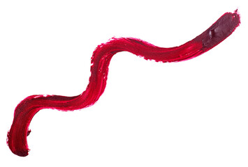 Red color lipstick brush stroke isolated on a white background, top view.