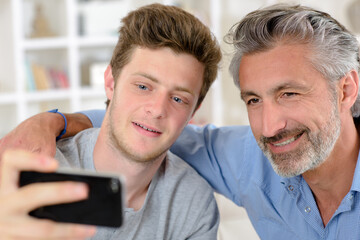 two men with a smartphone
